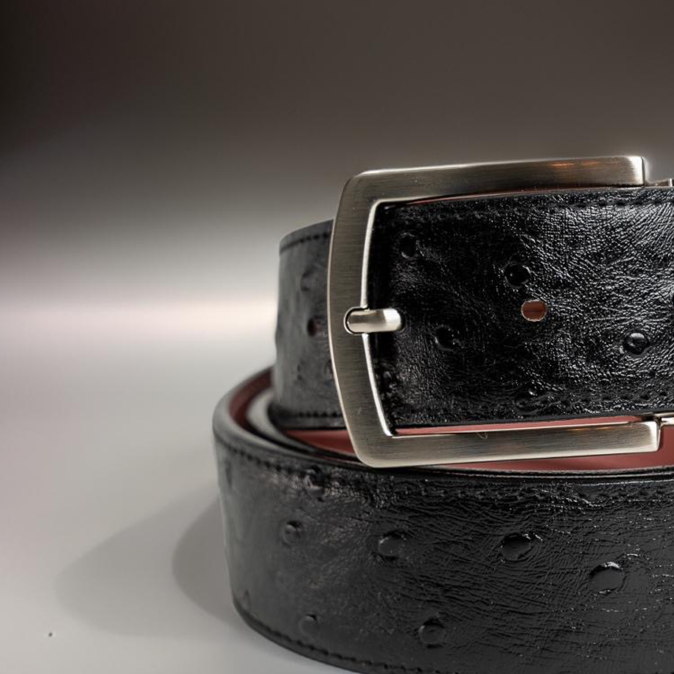 Black ostrich leather strap with Silver Prong Buckle